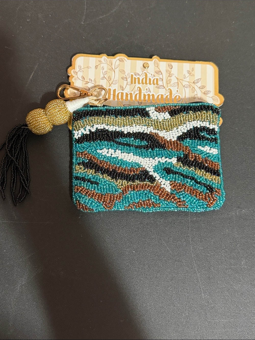 Made in India beaded animal stripe teal, black, gold , and brown beaded pouch